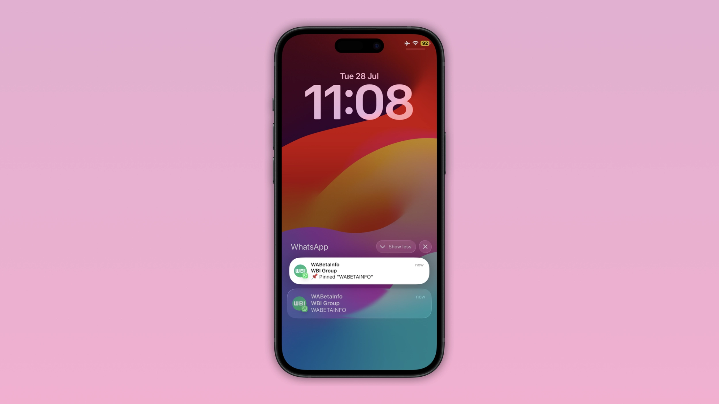 The image shows the pinned message notification feature on WhatsApp for iOS